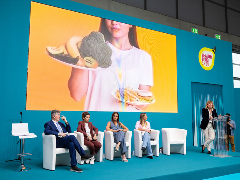 stand with a rich display of fruit and vegetables